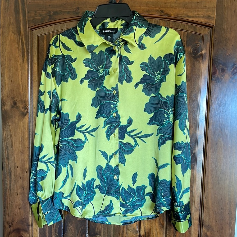 BAILEY 44 ladies button down blouse in green and black in a botanical print.